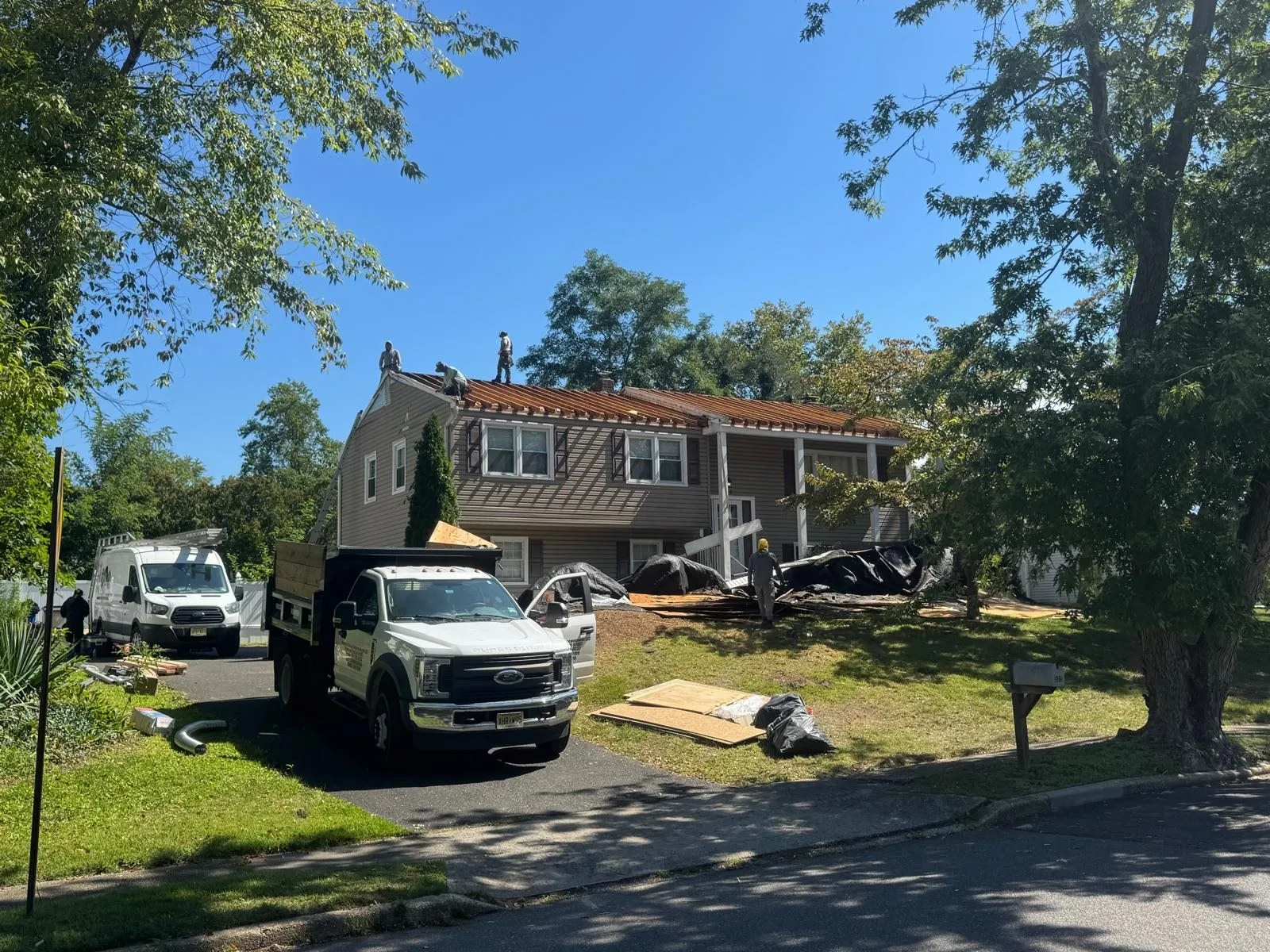 Imperial crew truck at a re-roof job